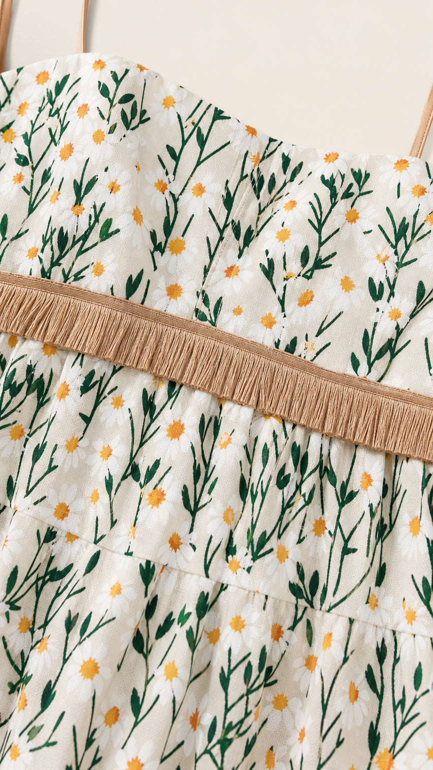 Close-up of fabric pattern and waist fringe detail