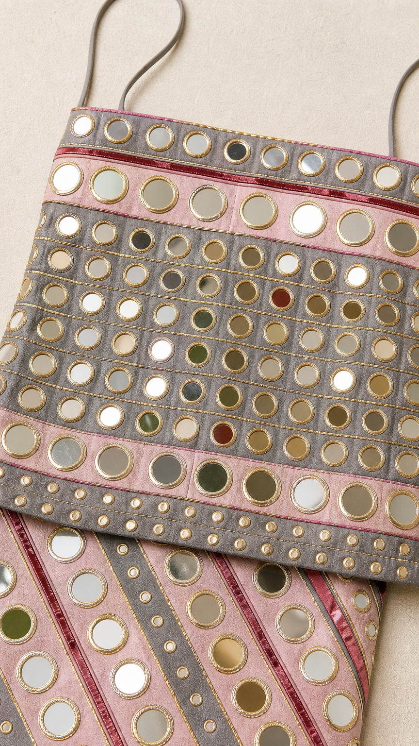 Close-up detail of the mirrored sequin fabric and texture