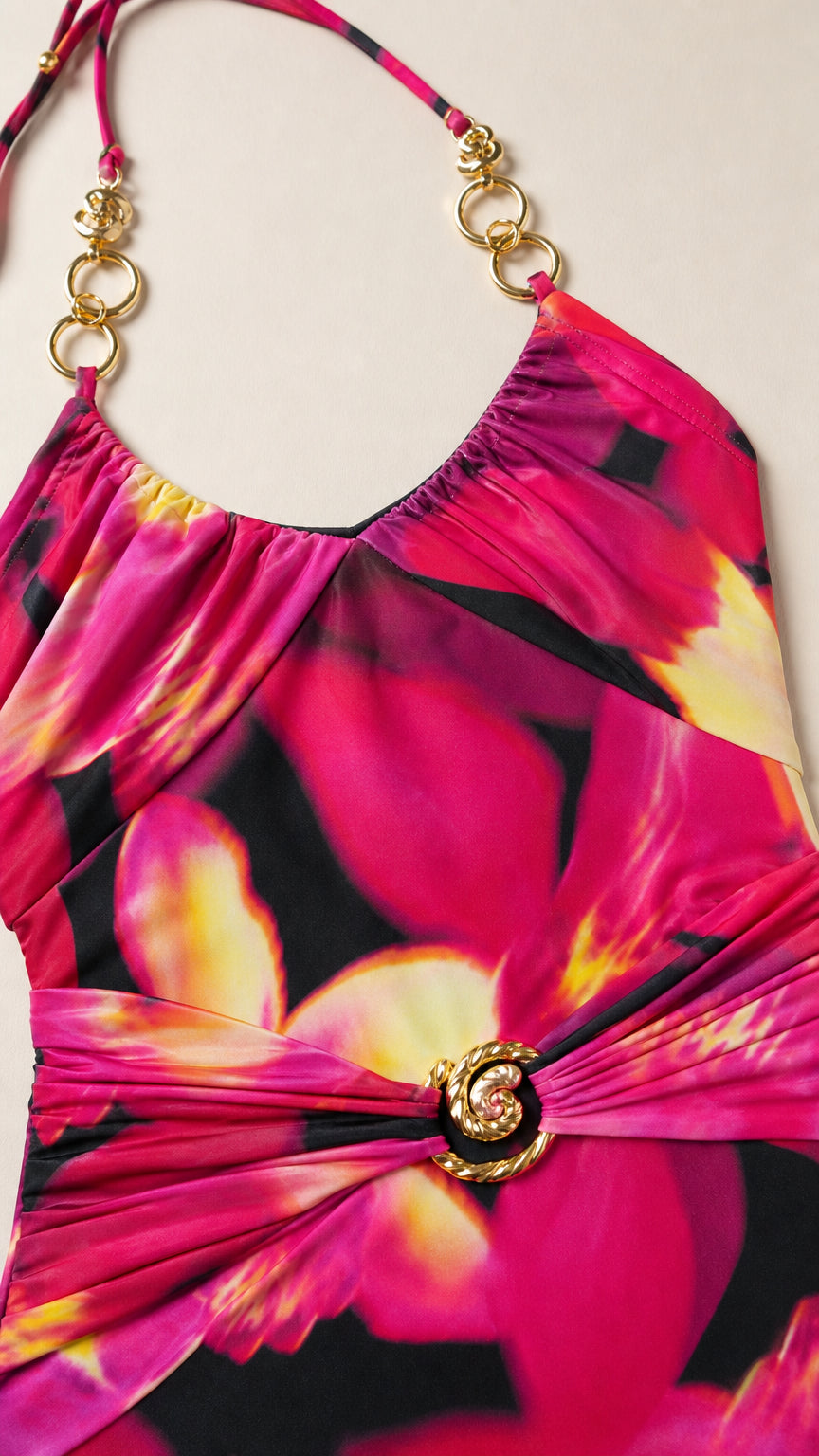 Close-up detail of halter neckline and waist hardware