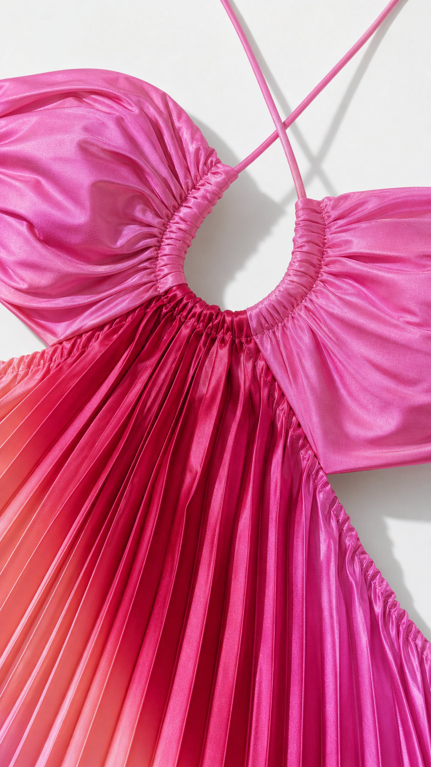 Close-up detail of gathered halter neckline and cutout on pink dress