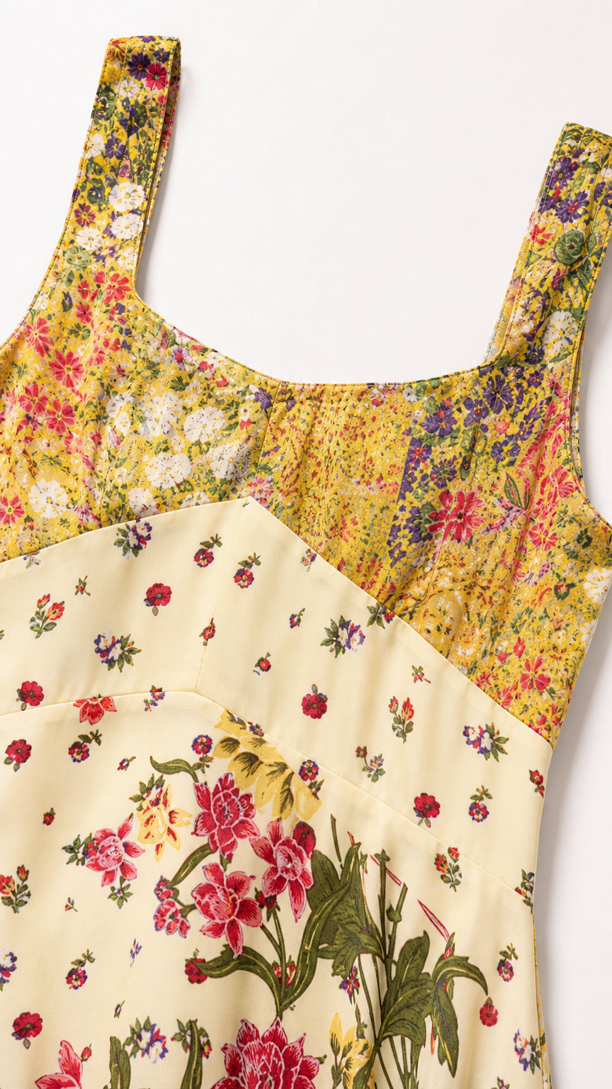 Close-up detail of yellow floral patchwork square neckline