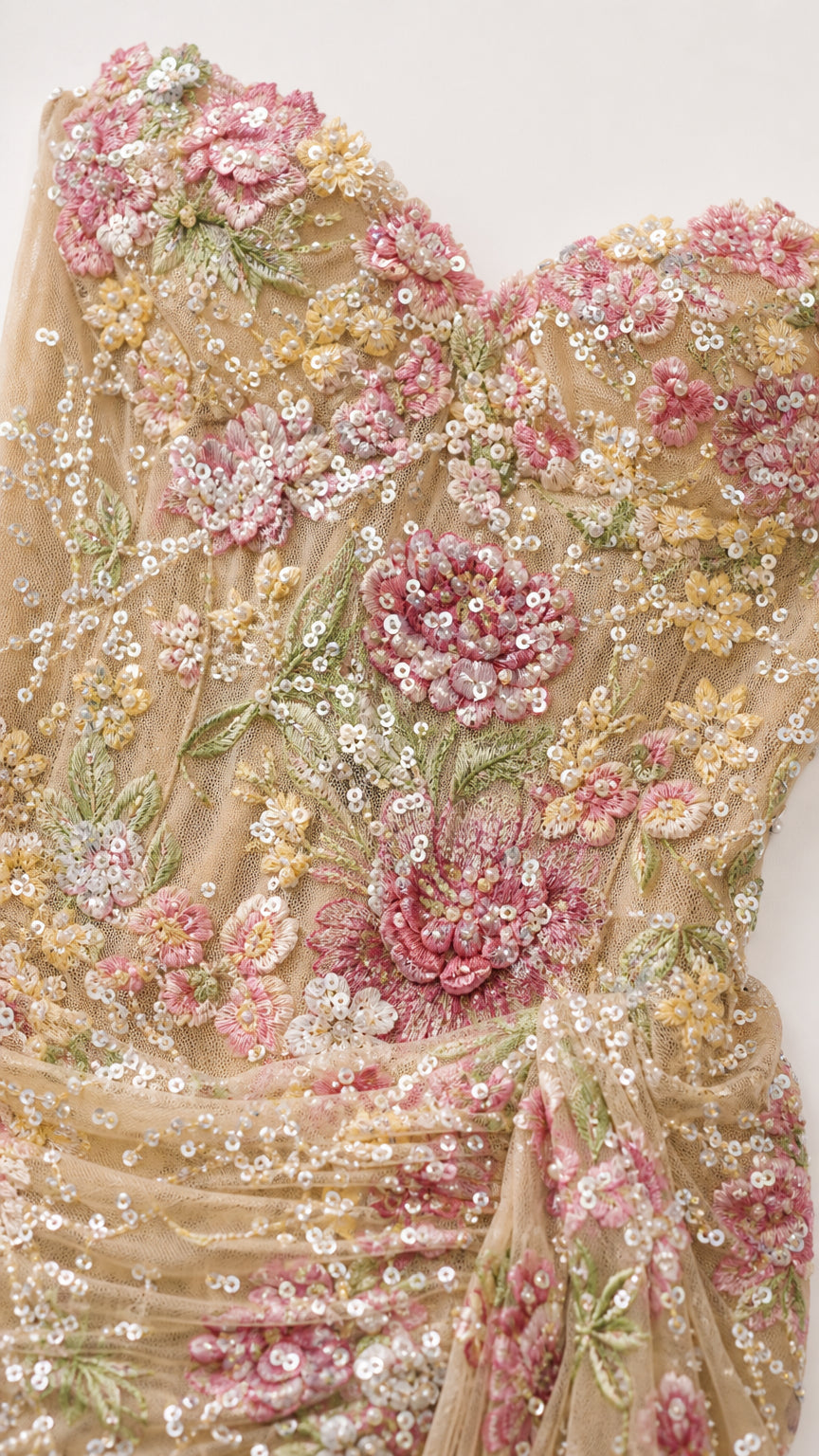 Close-up detail of sequin and floral beadwork