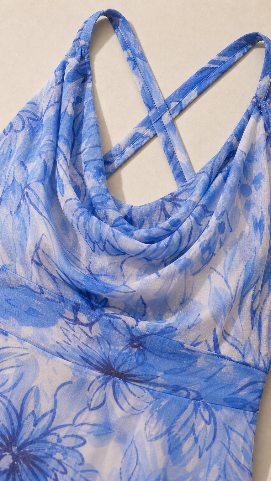 Close-up detail of cowl neckline and blue floral fabric