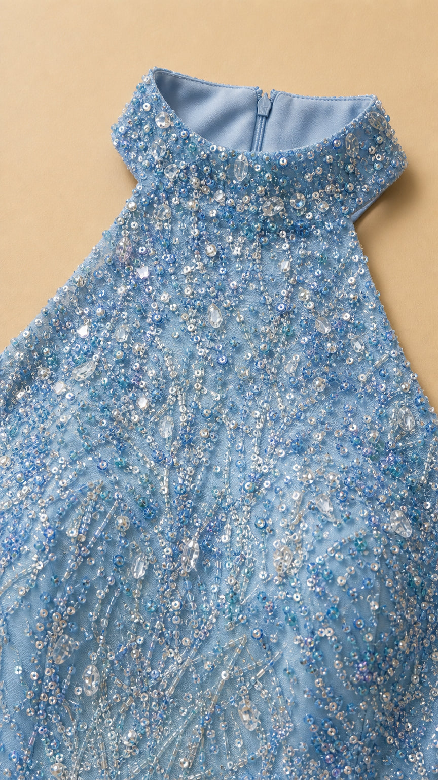 Close-up detail of halter neckline and beadwork
