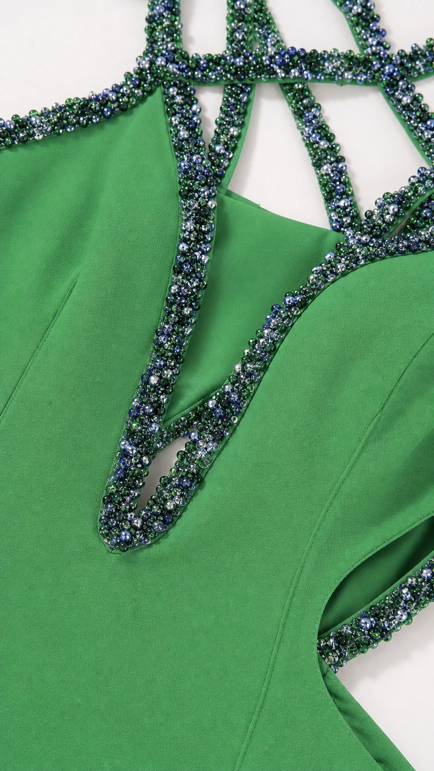 Close-up detail of beaded embellishments on neckline