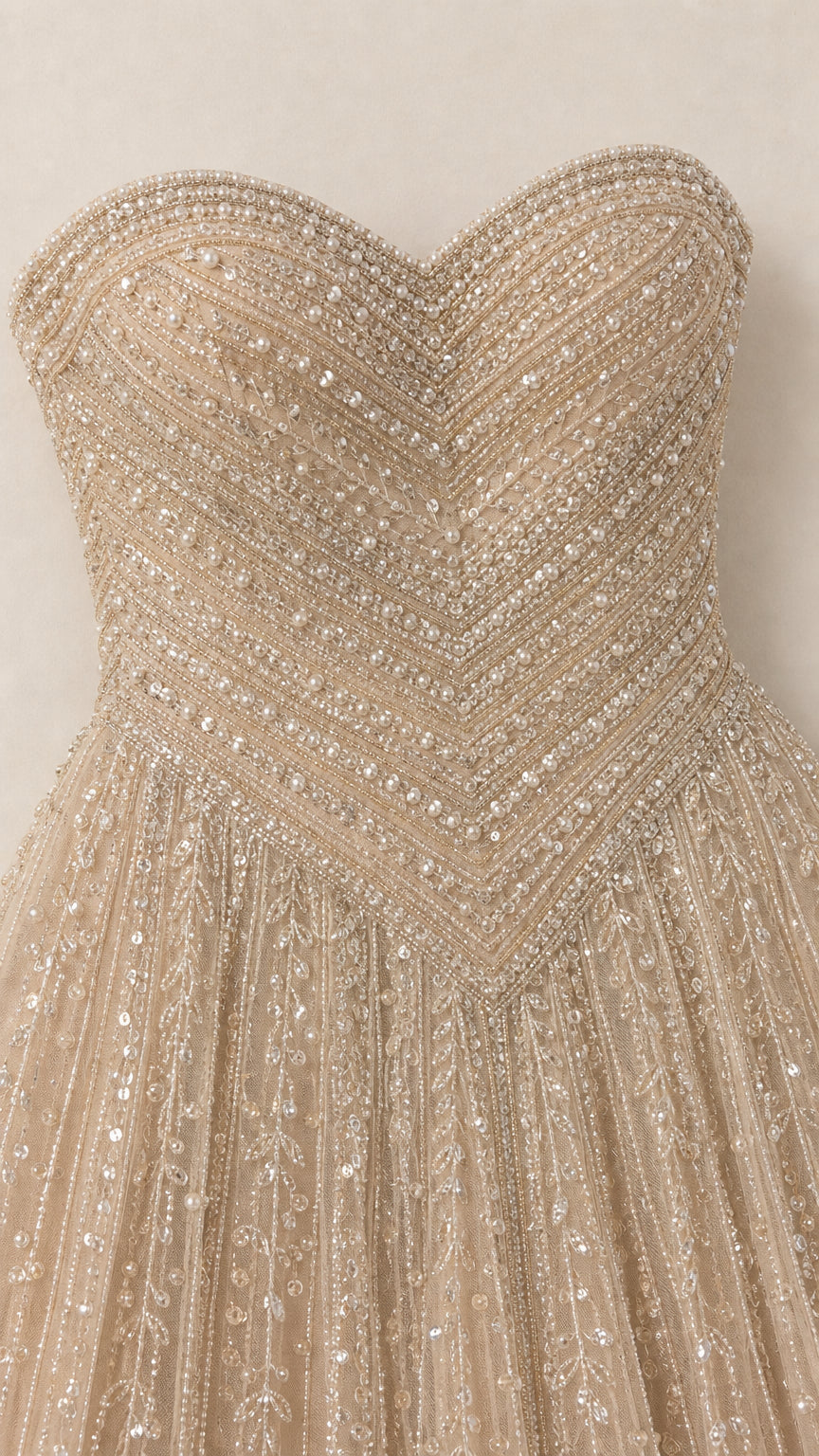Close-up detail of sweetheart neckline and chevron beadwork