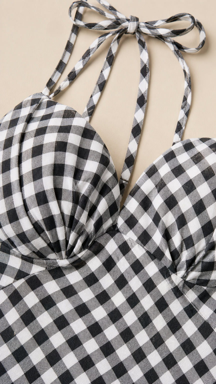Close-up detail of sweetheart neckline and tie straps on gingham dress