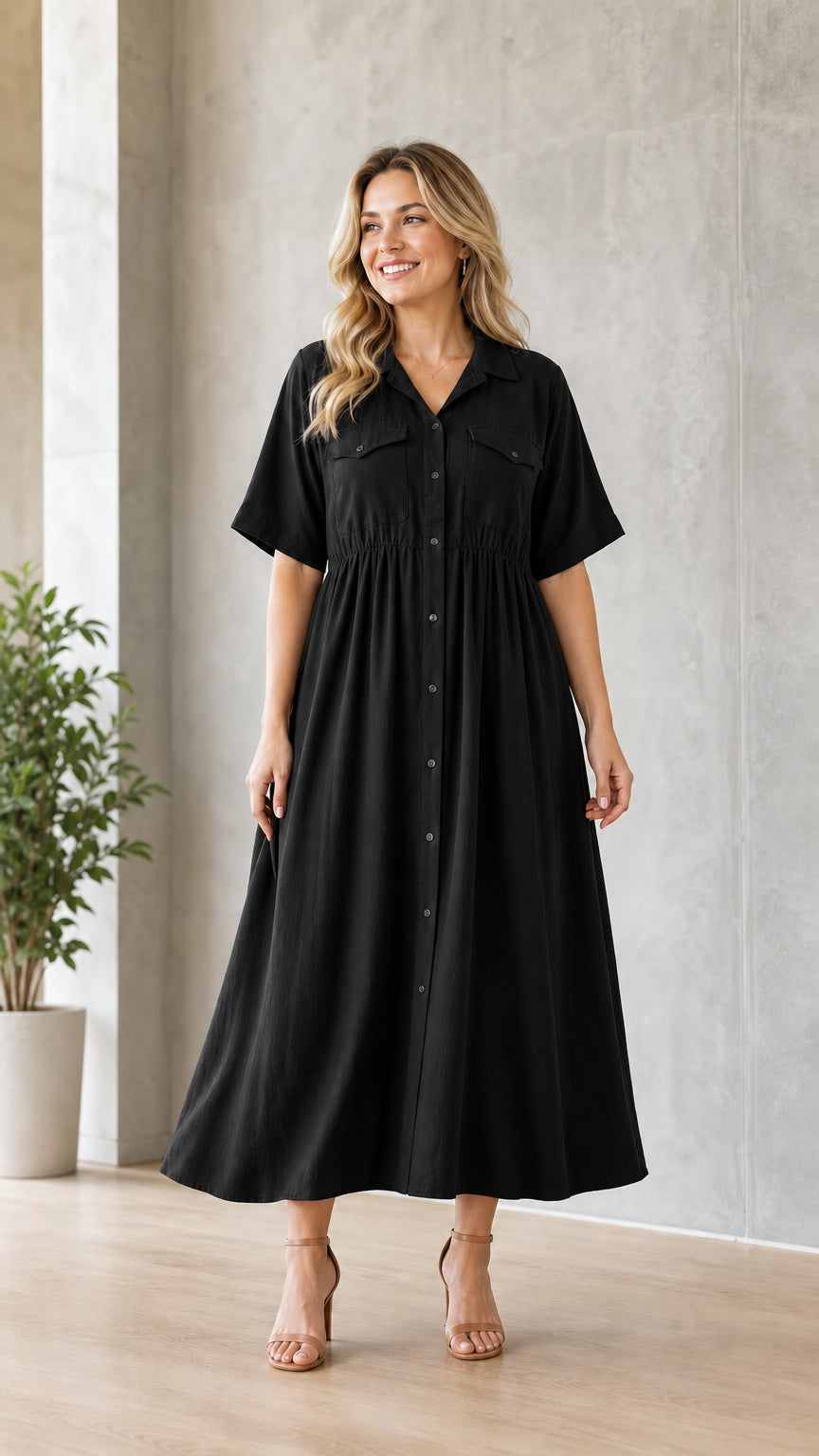 Woman wearing black utility midi shirt dress