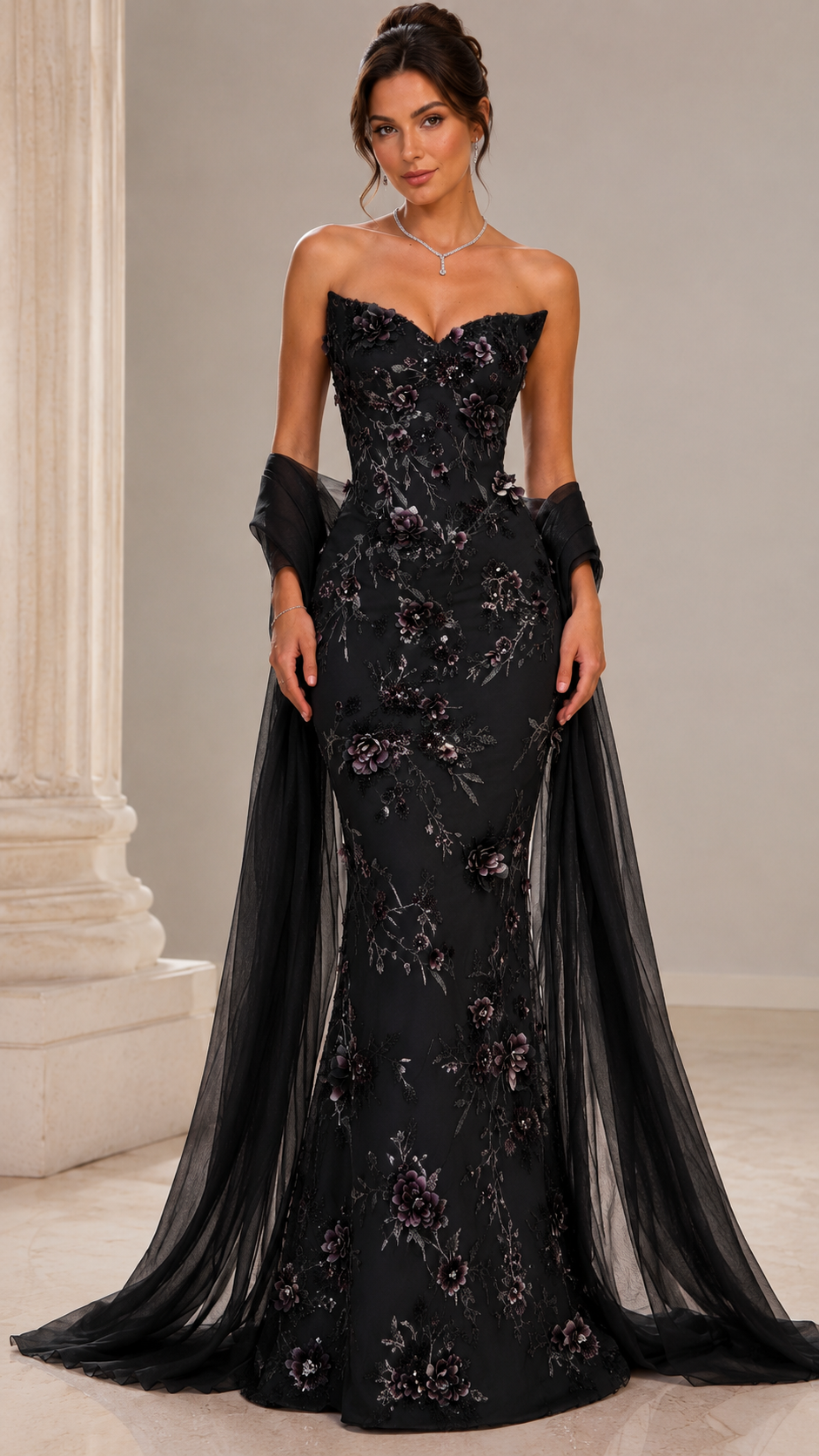 Front view of black floral embellished mermaid formal gown with black sheer shawl