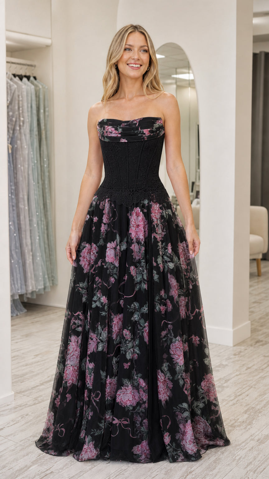 Model wearing black strapless floral corset long dress
