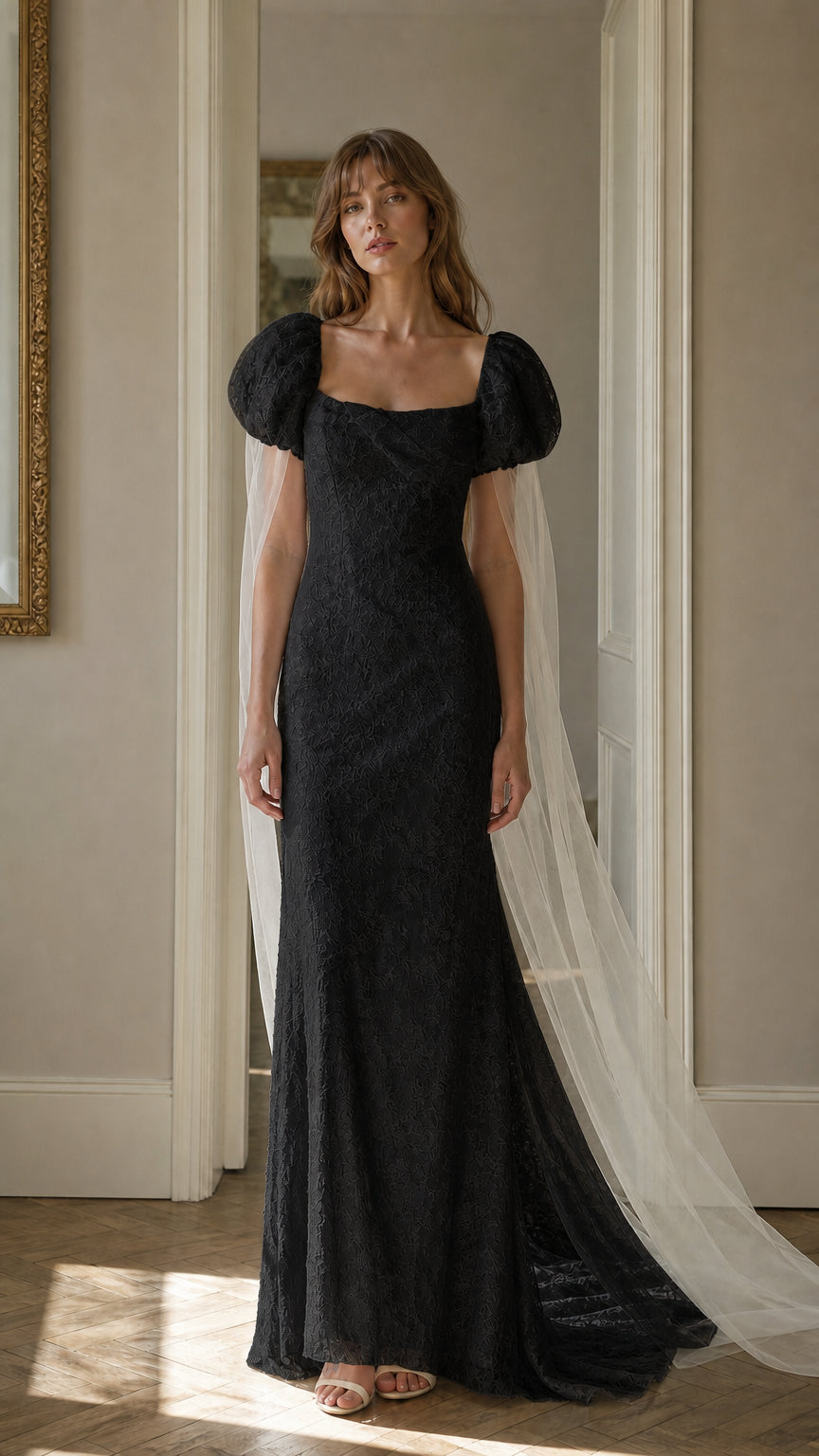 Front view of black lace maxi dress with cape
