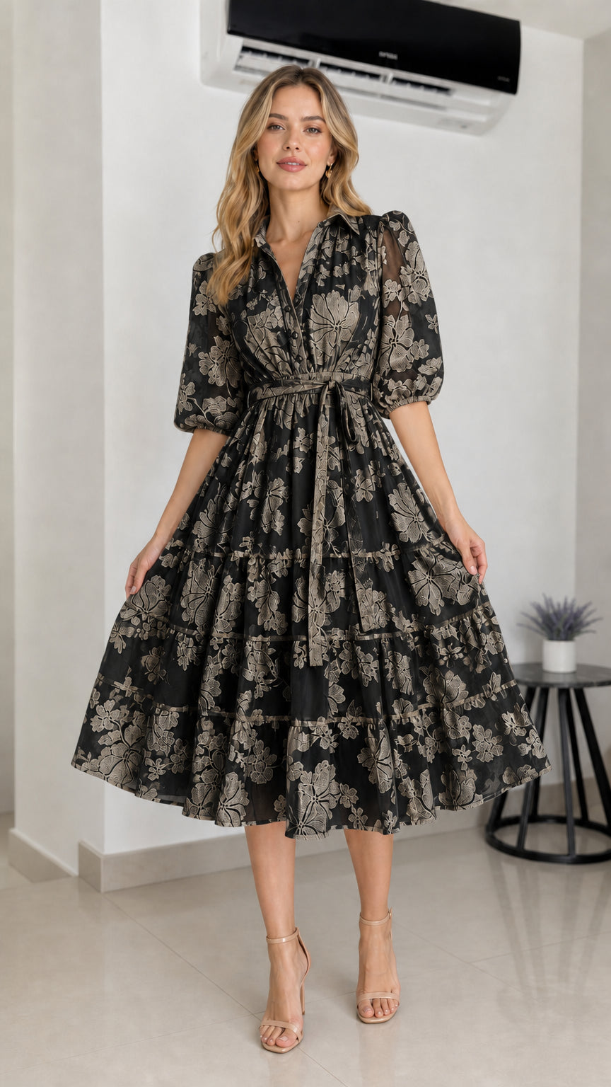 Front view of black floral embroidered midi dress