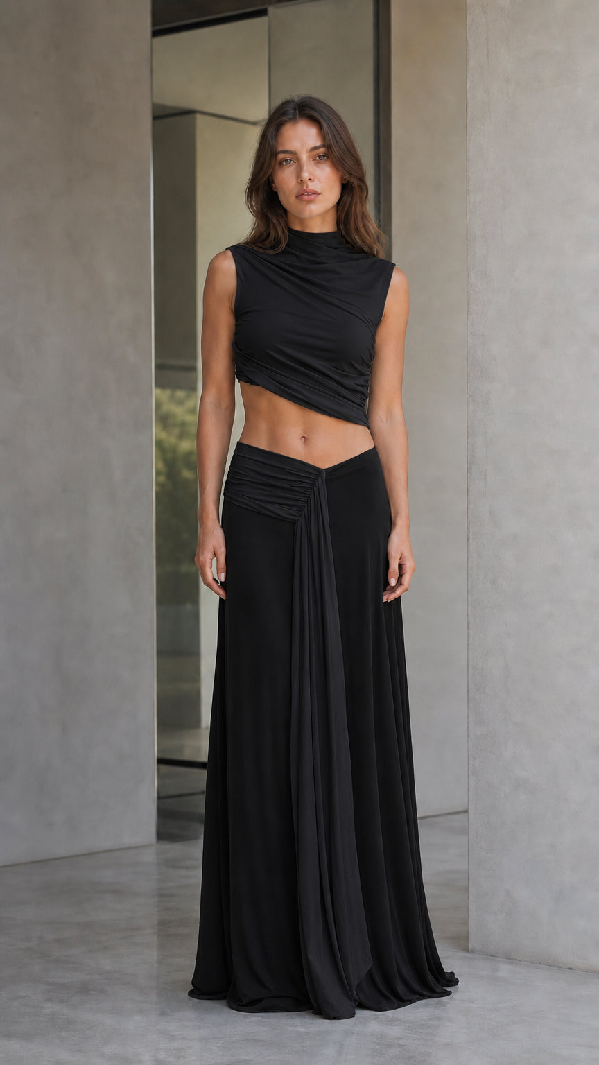 Front view of all-black two-piece maxi dress set