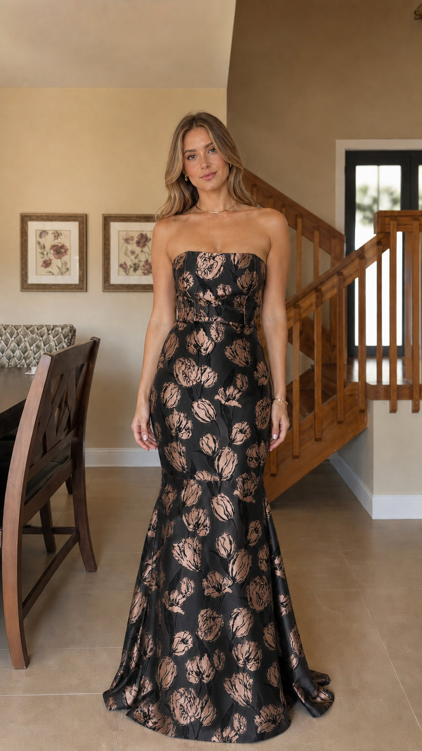 Model wearing black floral jacquard mermaid evening dress