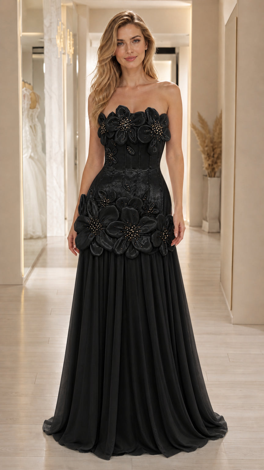 Front view of black 3D floral strapless evening gown