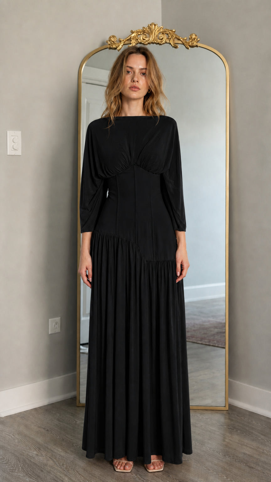 Front view of model wearing black long-sleeve maxi dress