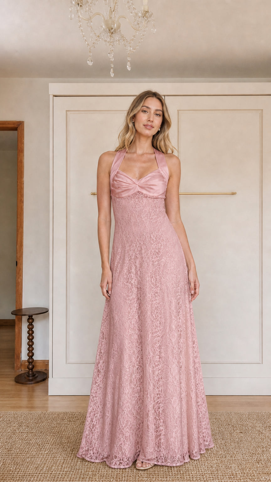 Front view of model wearing Pink halter neck lace maxi dress