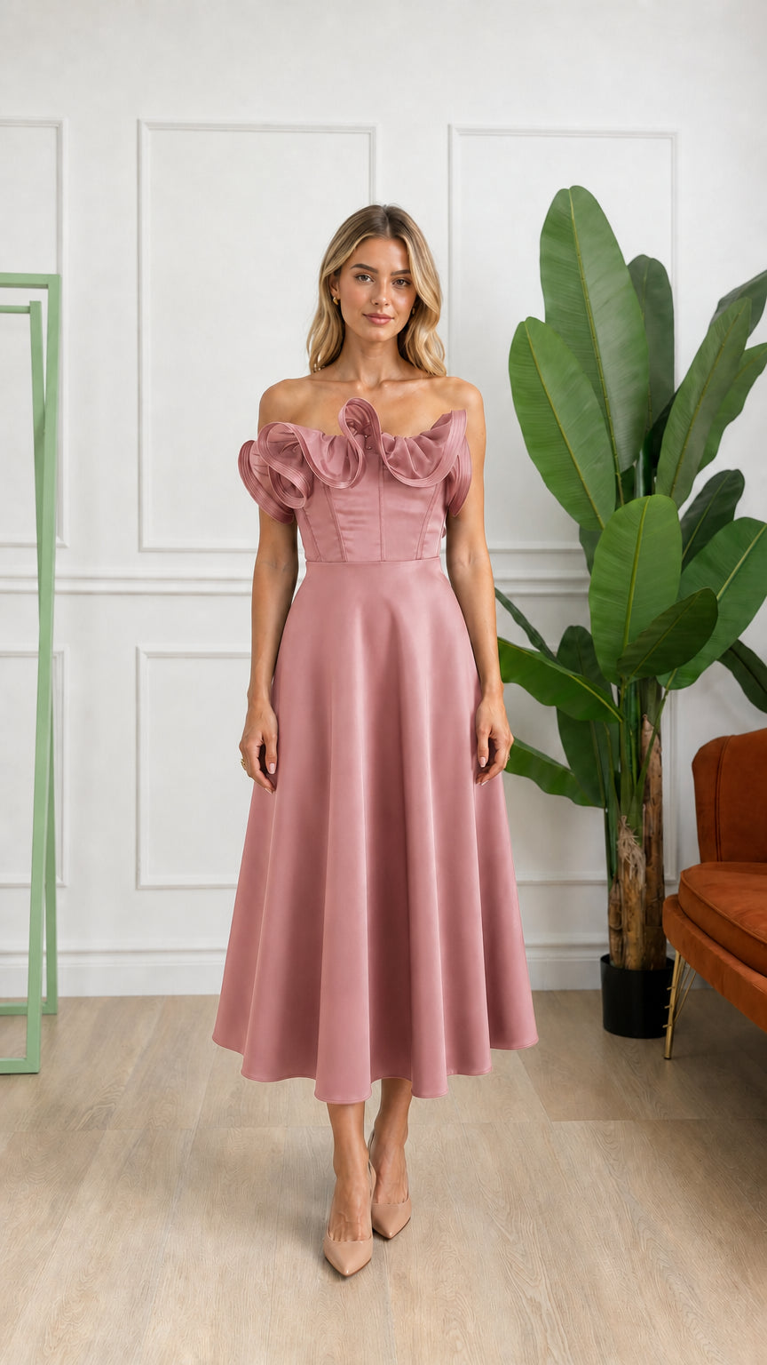 Front view of woman wearing dusty rose off-shoulder ruffle corset midi dress