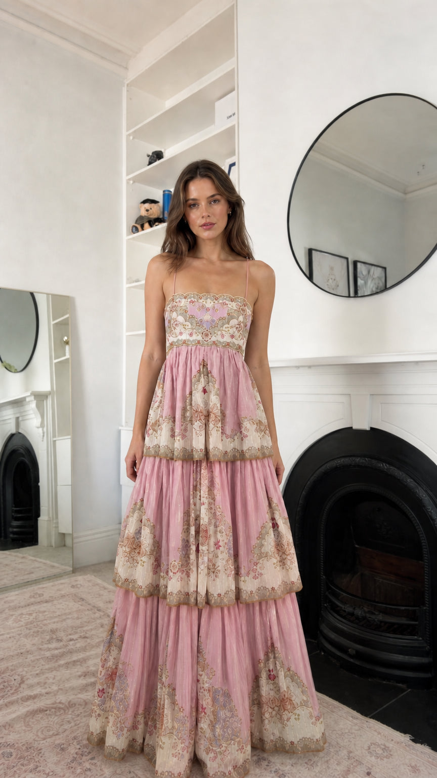 Blush pink floral tiered maxi dress shown from the front