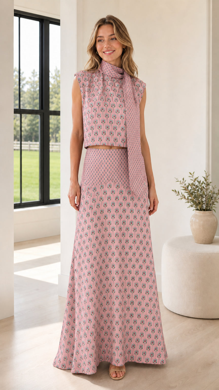 Front view of model wearing pink patterned two-piece set