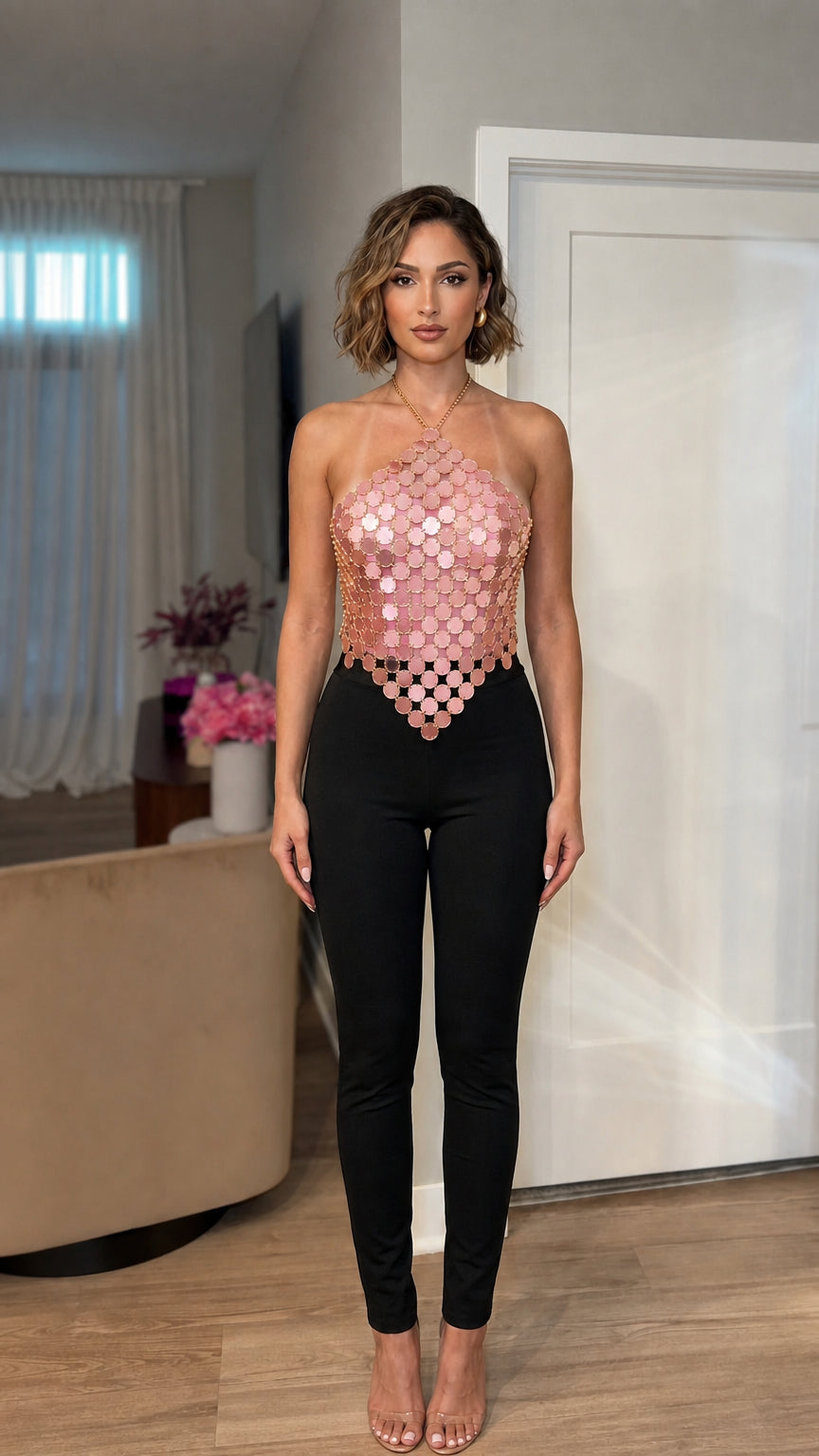 Model wearing pink metallic sequin halter top