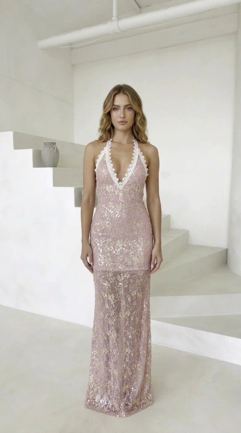 Front view of model wearing blush pink sequin dress