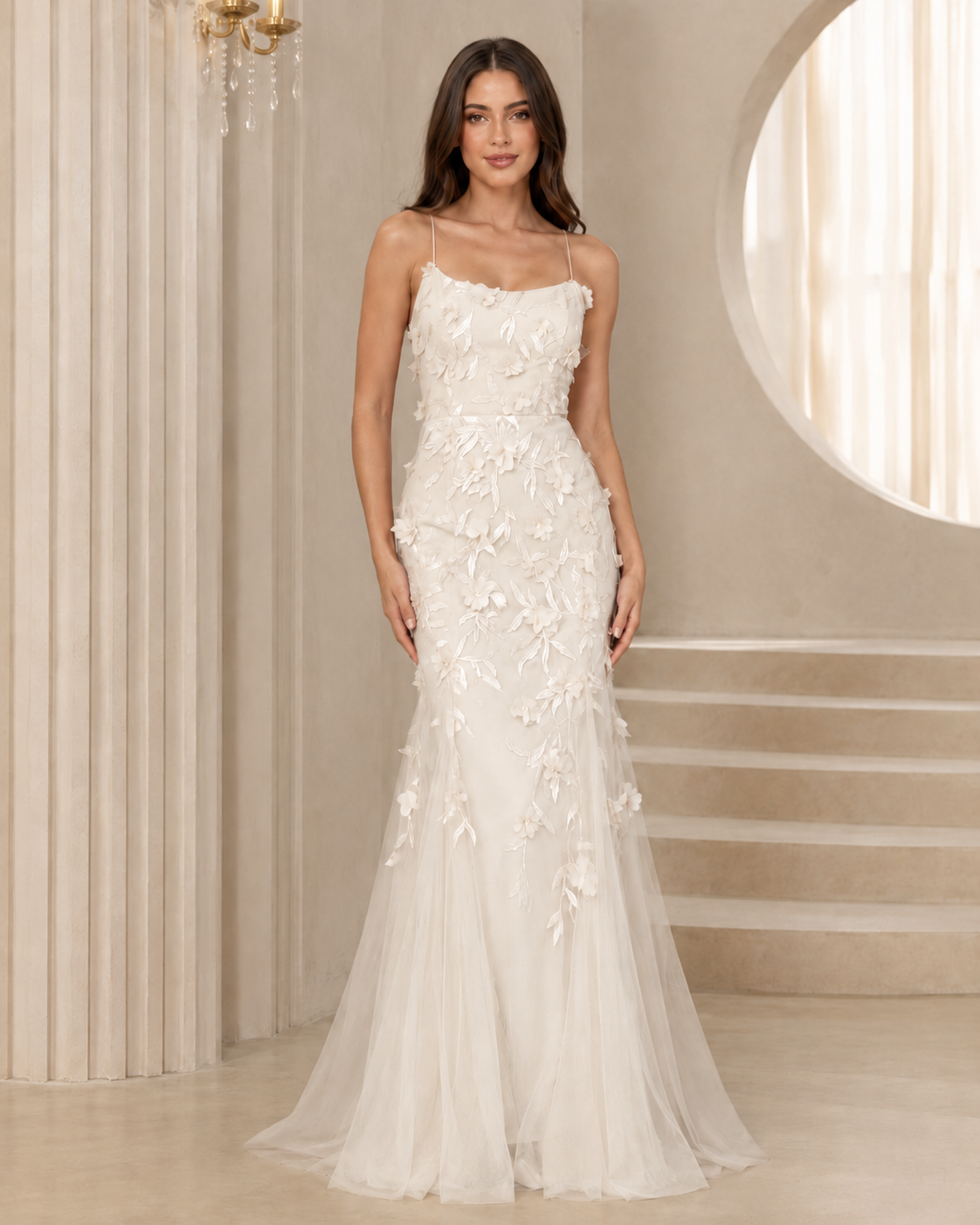 Front view of ivory floral appliqué spaghetti strap mermaid gown
