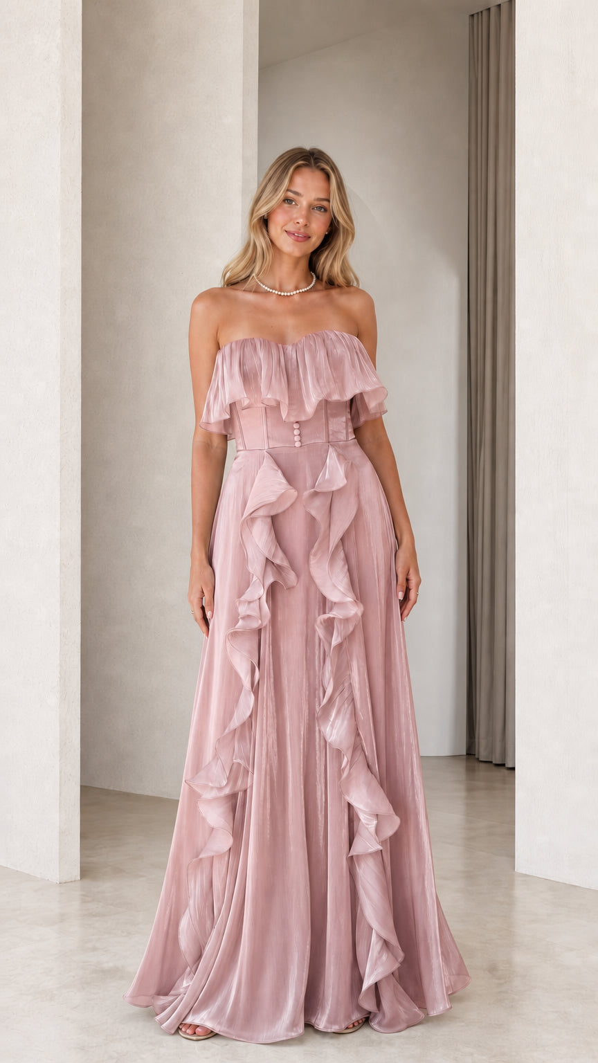 Front view of dusty pink strapless ruffled evening dress