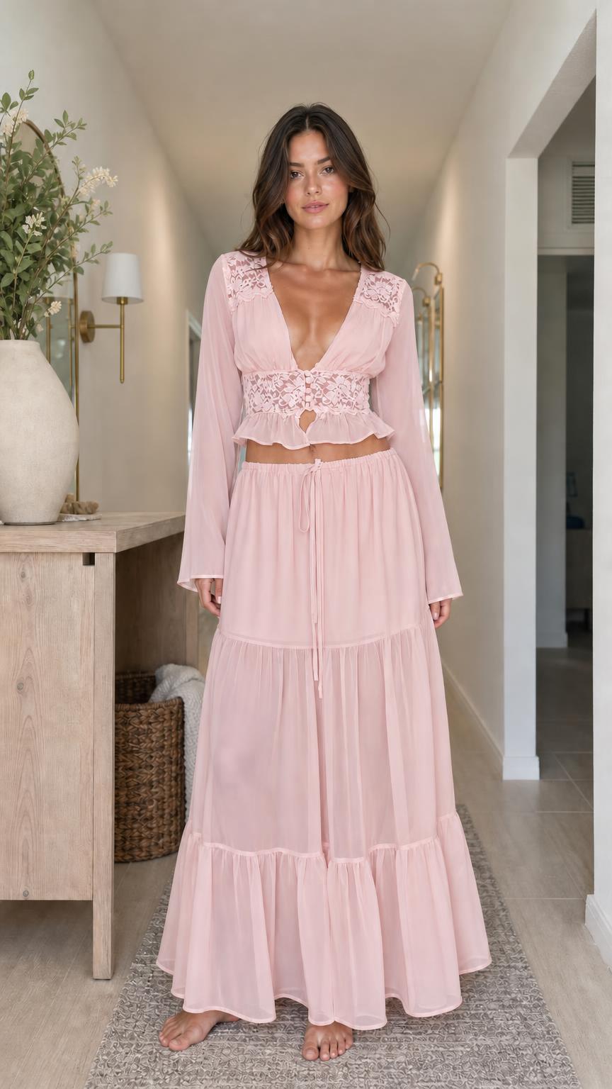 Model wearing soft pink two-piece set
