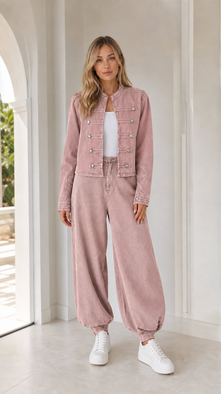 Front full view of woman wearing dusty pink utility jacket and matching pants