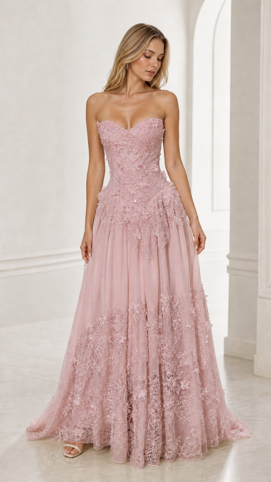 Front view of pink strapless floral applique ball gown
