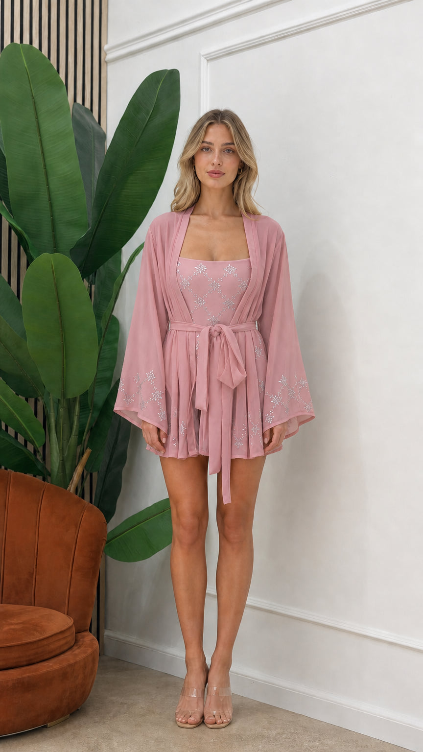 Front view of model wearing pink embellished three-piece kimono set