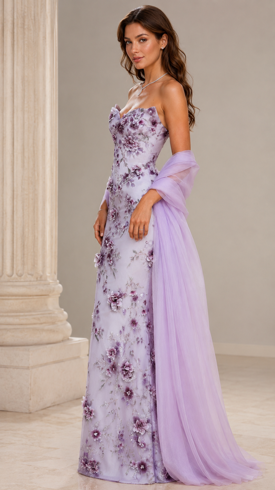 Side view of lilac strapless floral evening gown with flowing wrap