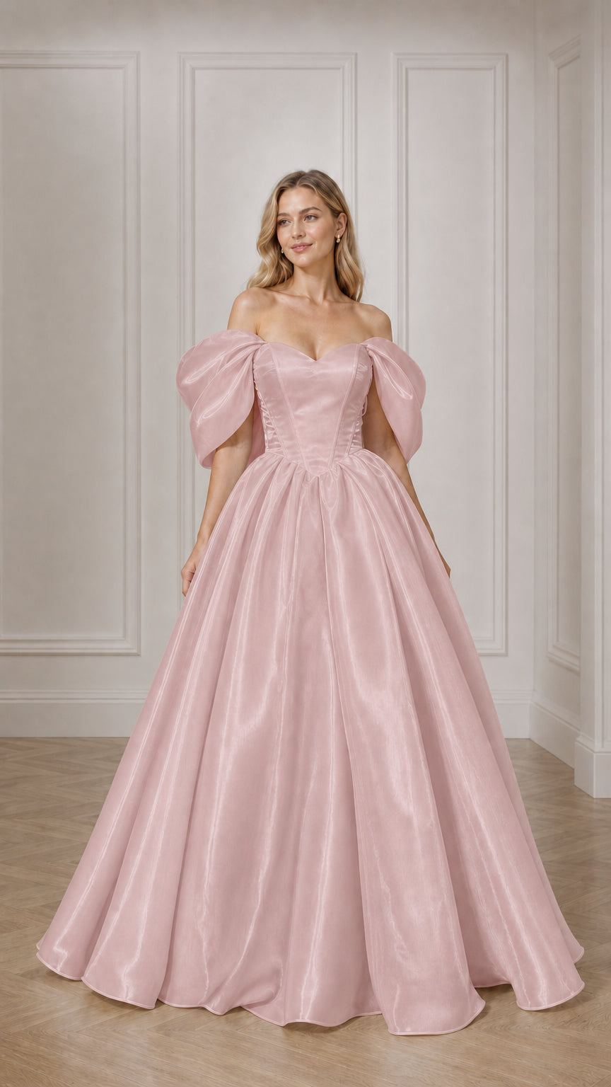 Full view of woman in pink off-the-shoulder satin ball gown