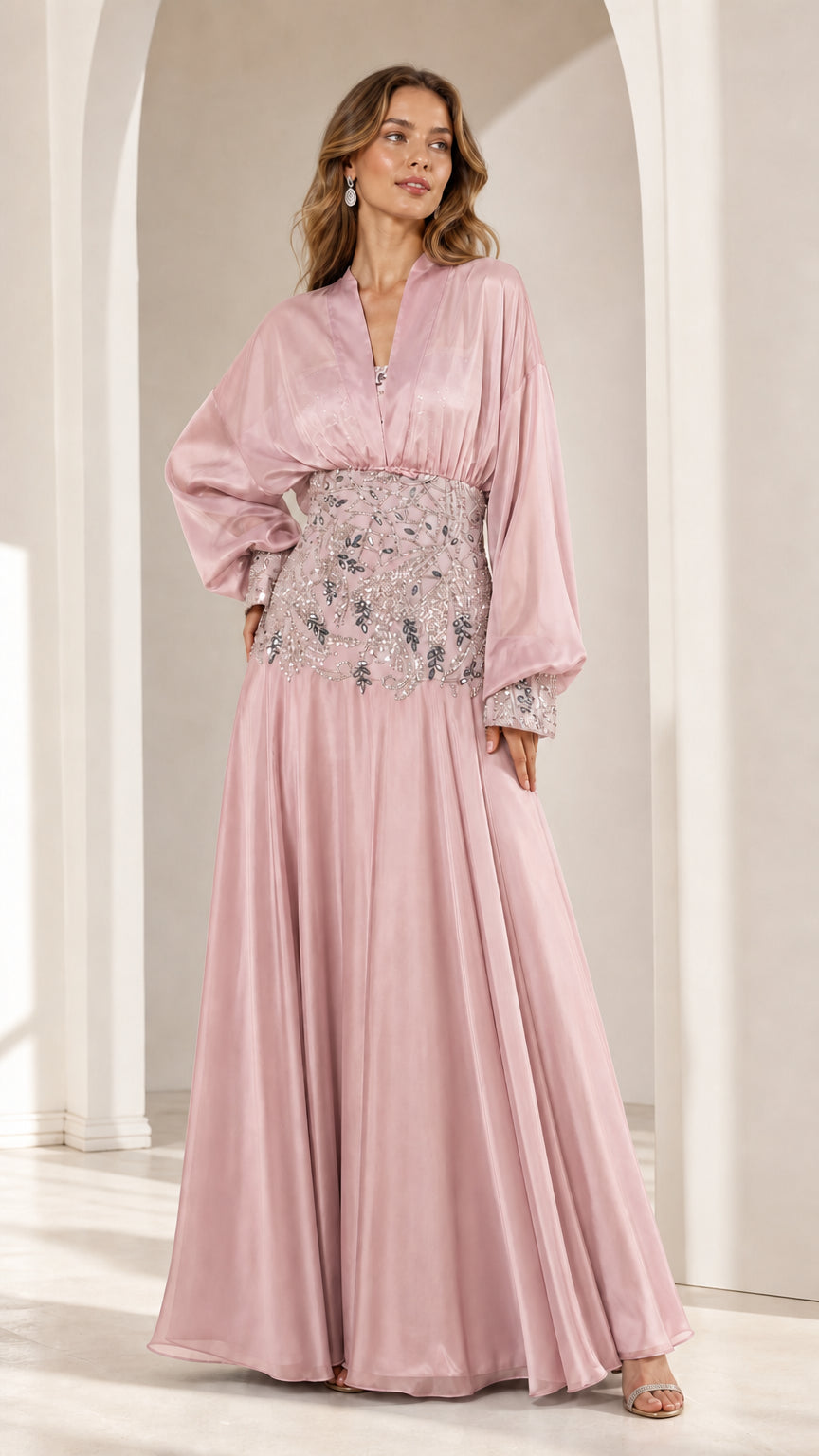 Full view of pink long sleeve formal gown