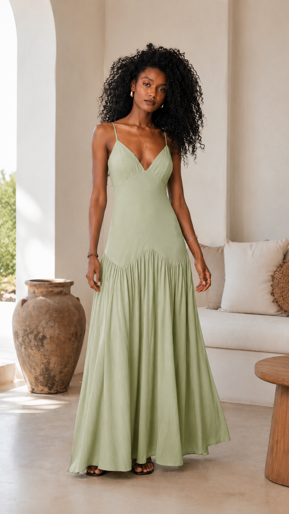 Sage green spaghetti strap maxi dress with flowing drop waist skirt front view