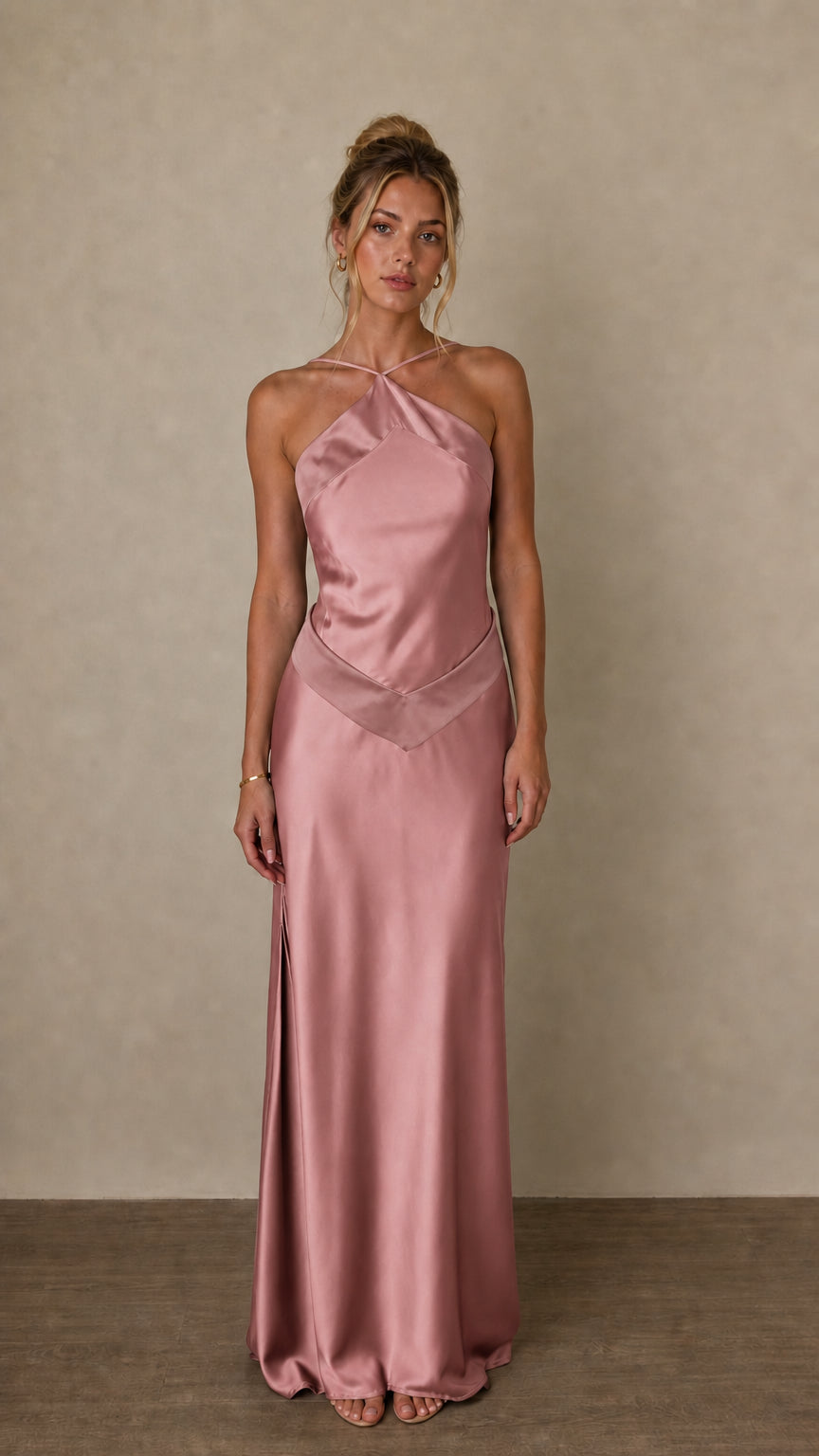 Front view of pink satin halter maxi dress on model