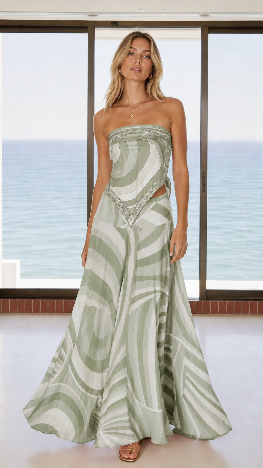 Front view of woman wearing sage green abstract swirl matching set