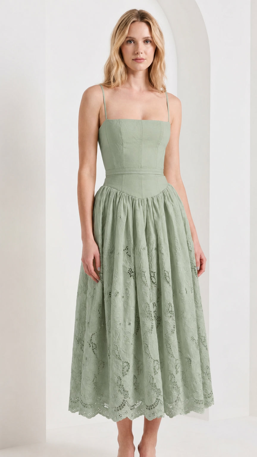 Front view of model wearing green sleeveless square neck embroidered midi dress