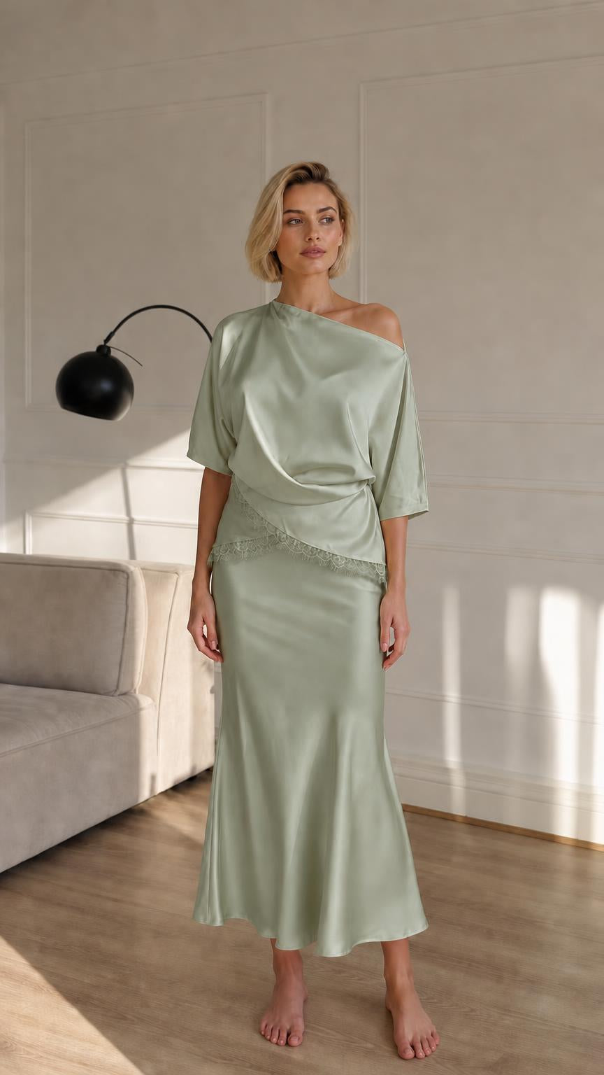 Woman wearing sage green satin two-piece set