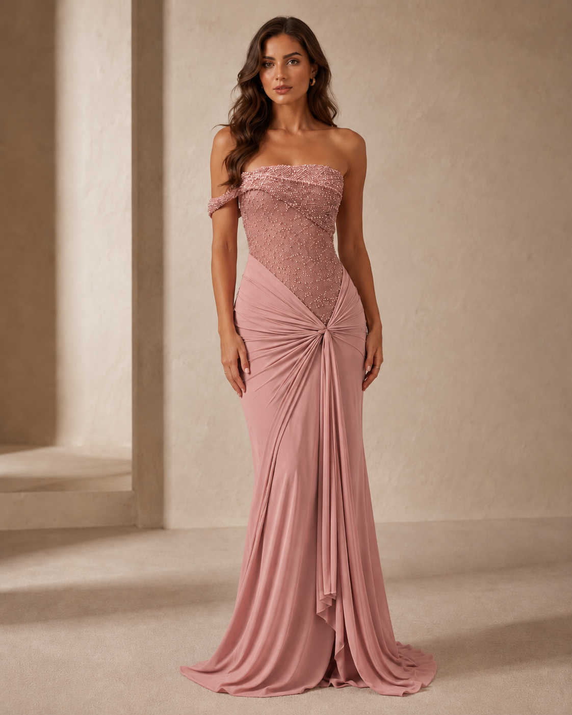 Blush pink off-shoulder beaded formal gown with gathered waist drape front view