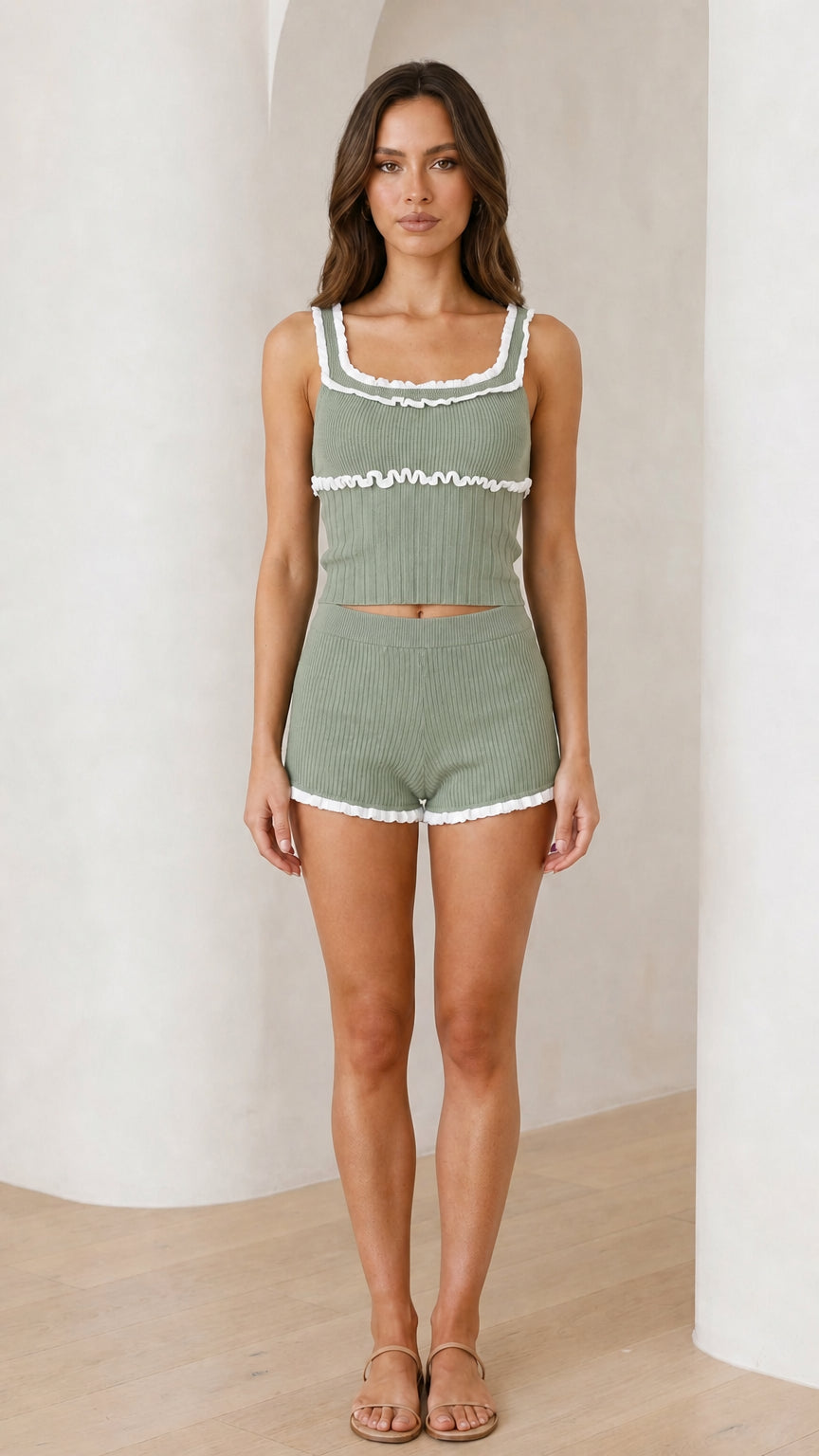 Front view of model wearing sage lounge set