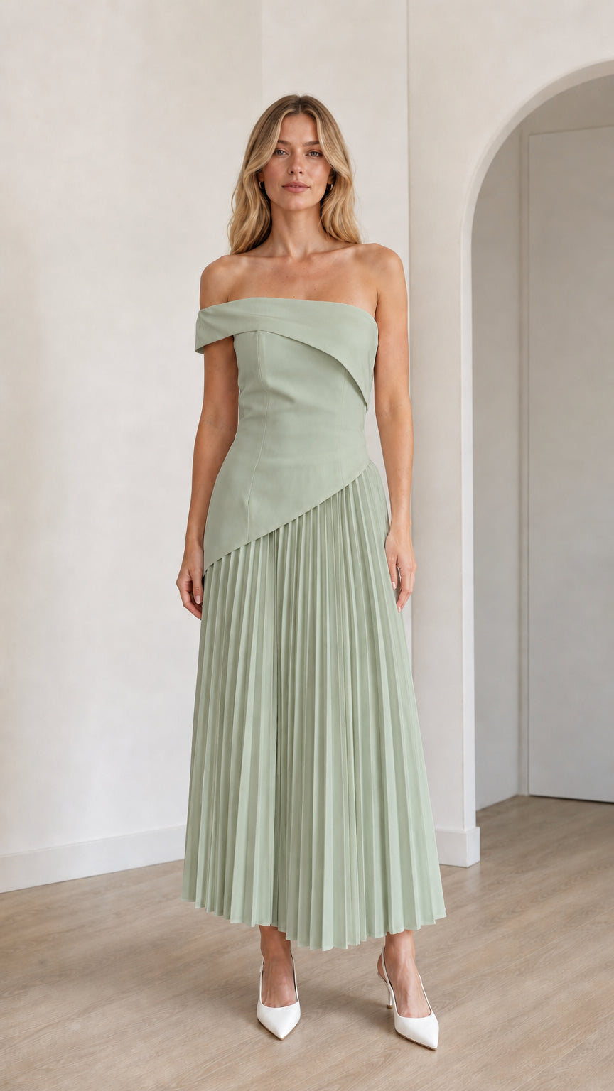 Model wearing sage green off-shoulder asymmetric pleated midi dress