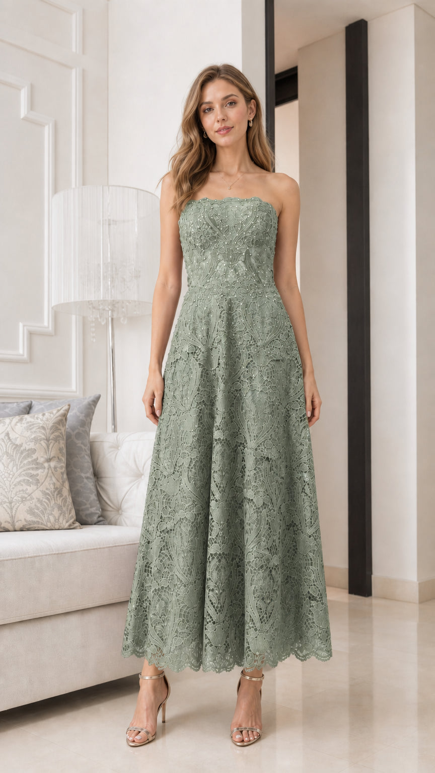 Front view of model wearing sage strapless lace midi dress