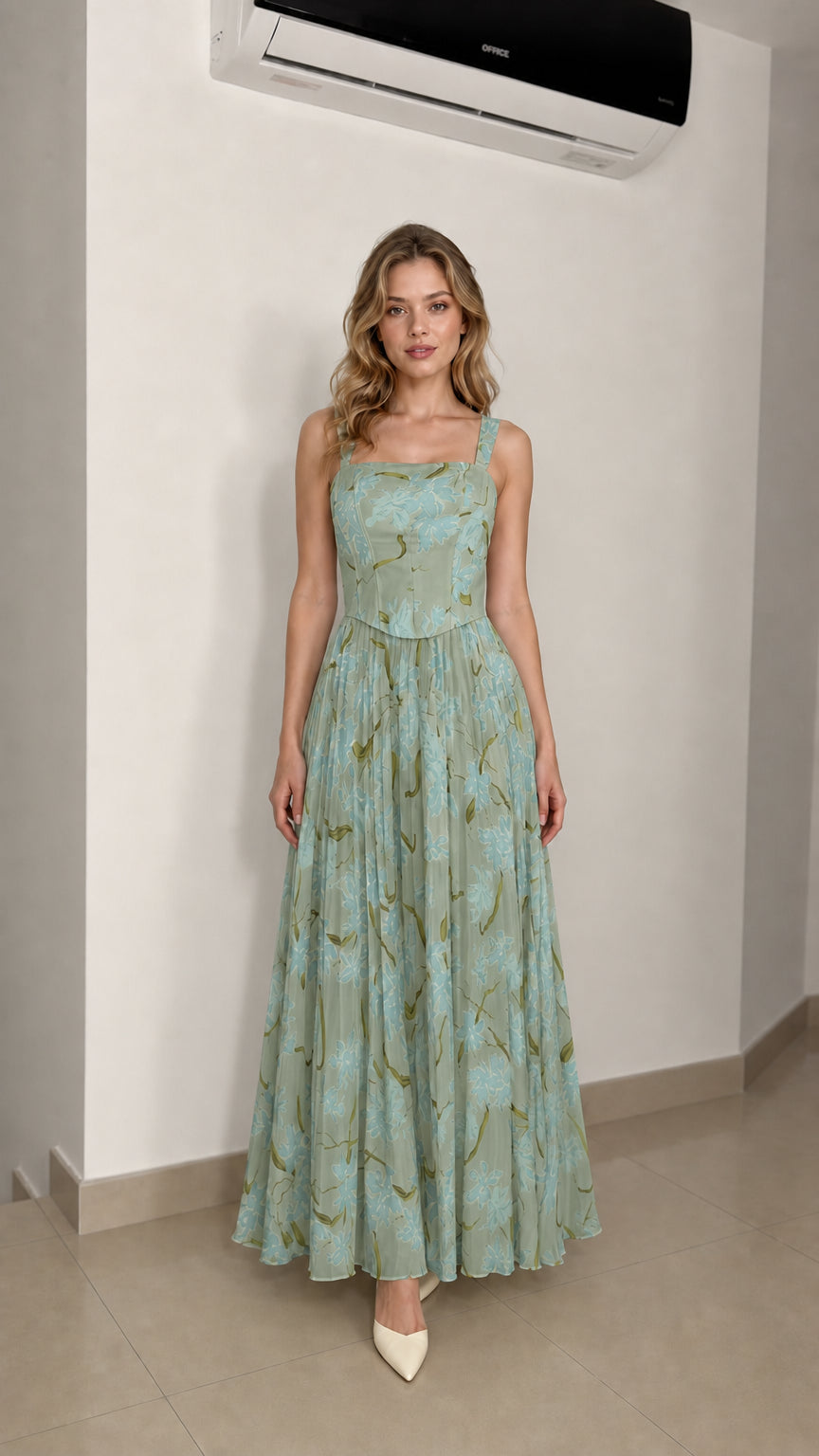 Model wearing sage floral maxi dress