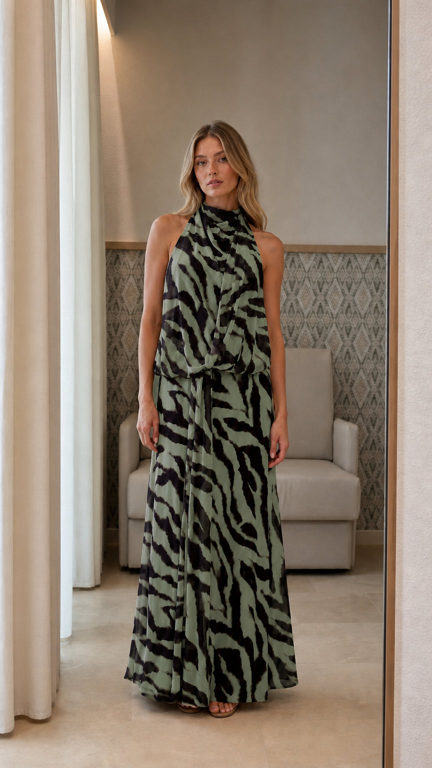 Front view of green animal print maxi dress