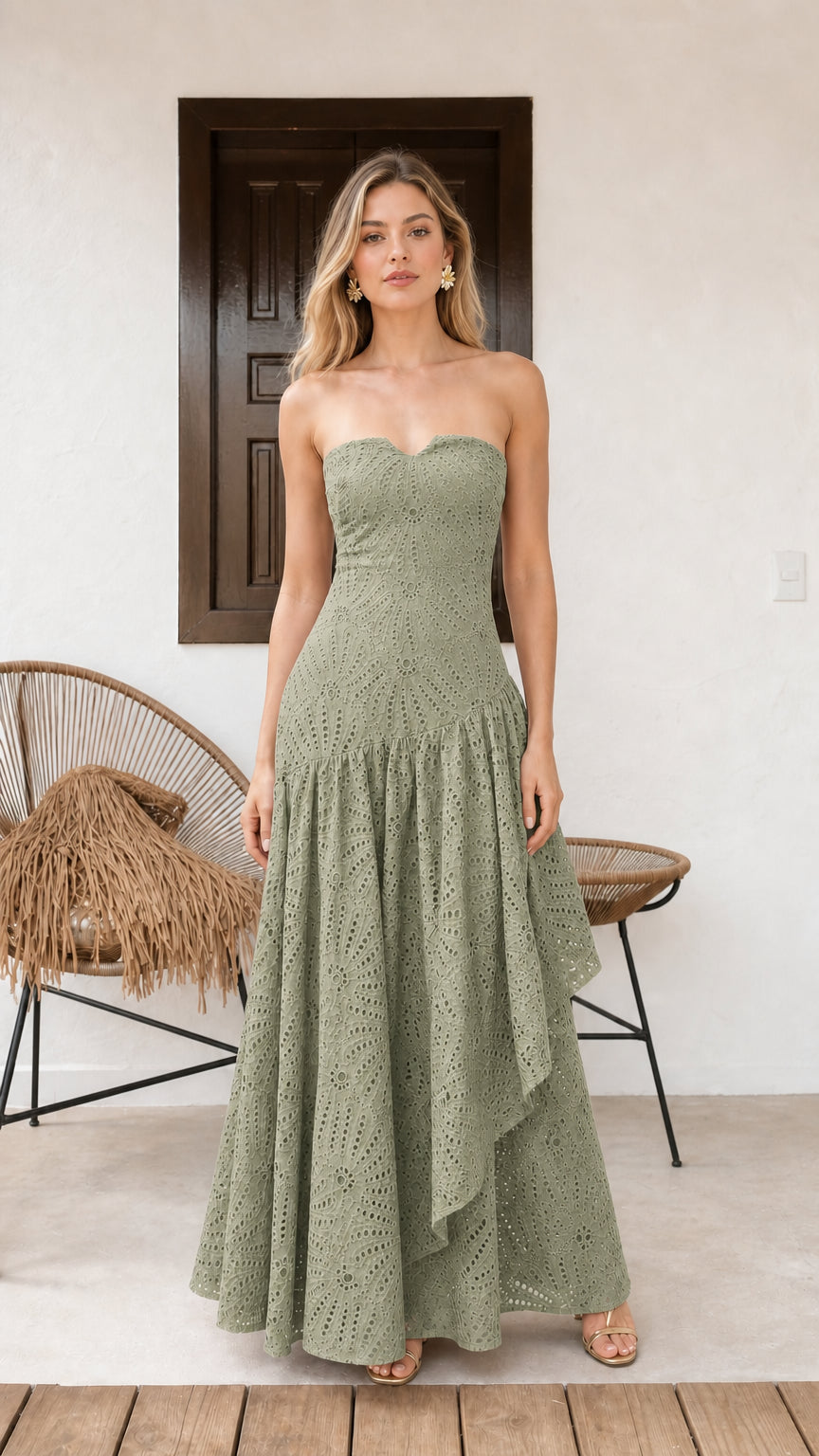 Model wearing sage green strapless eyelet maxi dress