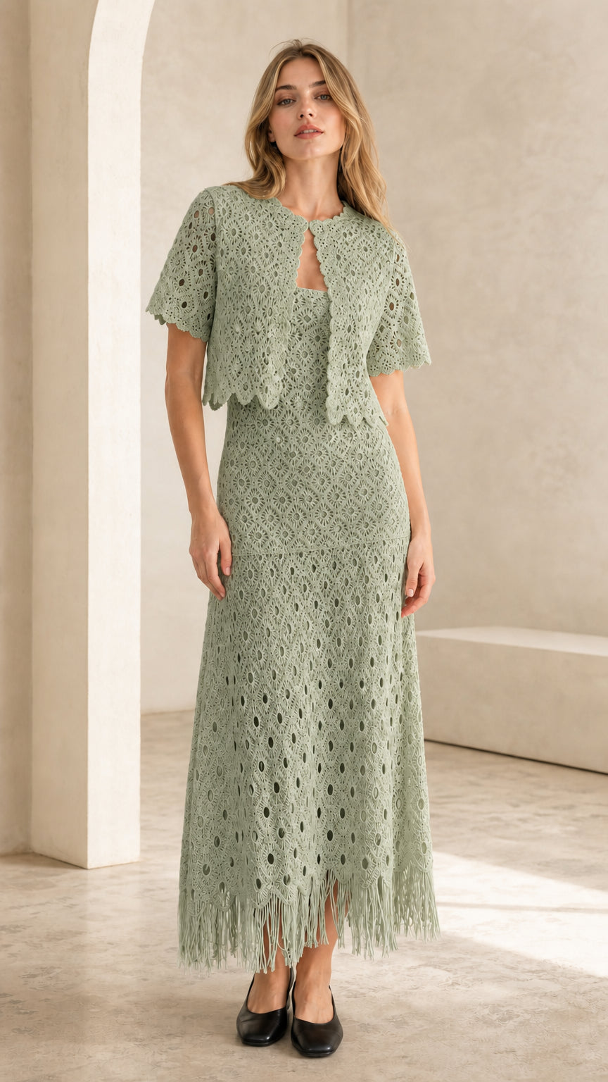Front view of sage green crochet lace two-piece set on model