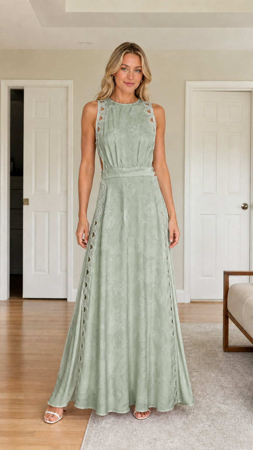 Front view of woman wearing sage green cutout maxi dress