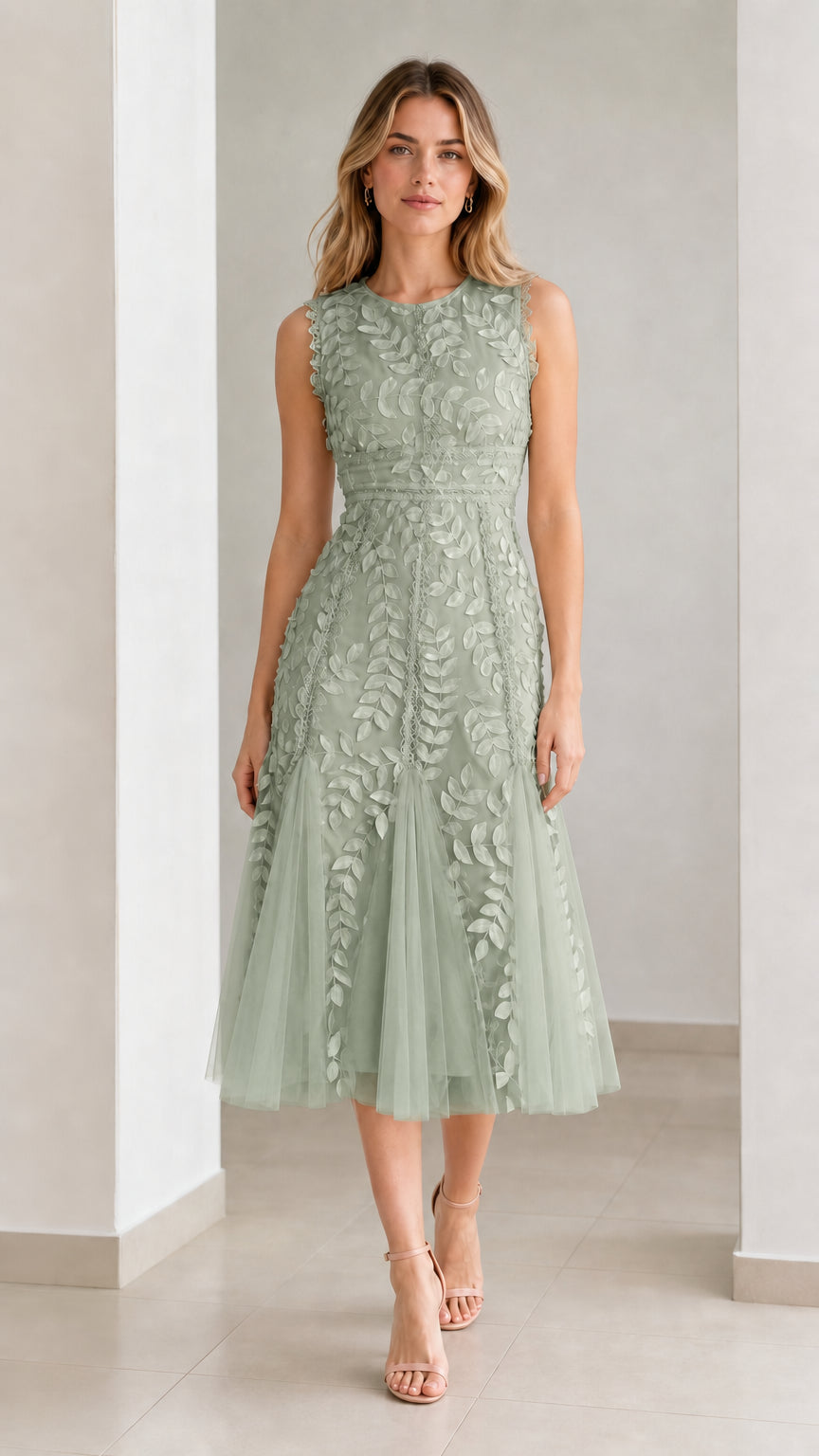 Front view of model wearing sage green embroidered leaf applique midi dress